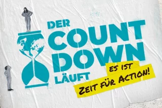 Key Visual des Schulwettbewerbs. Auf einer Wand steht: Der Countdown läuft. Es ist Zeit für Action